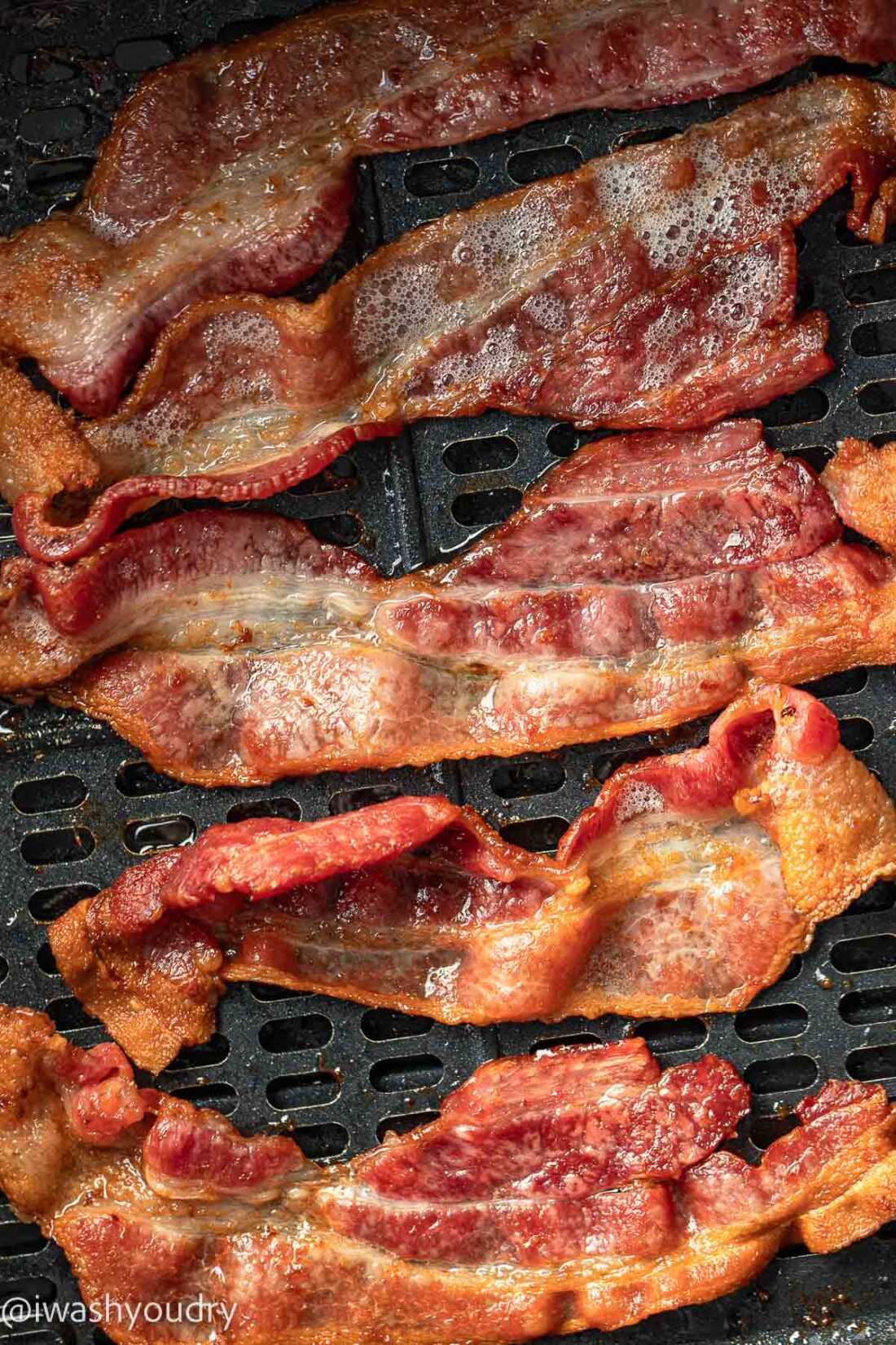 Cooked Bacon in Air Fryer Basket