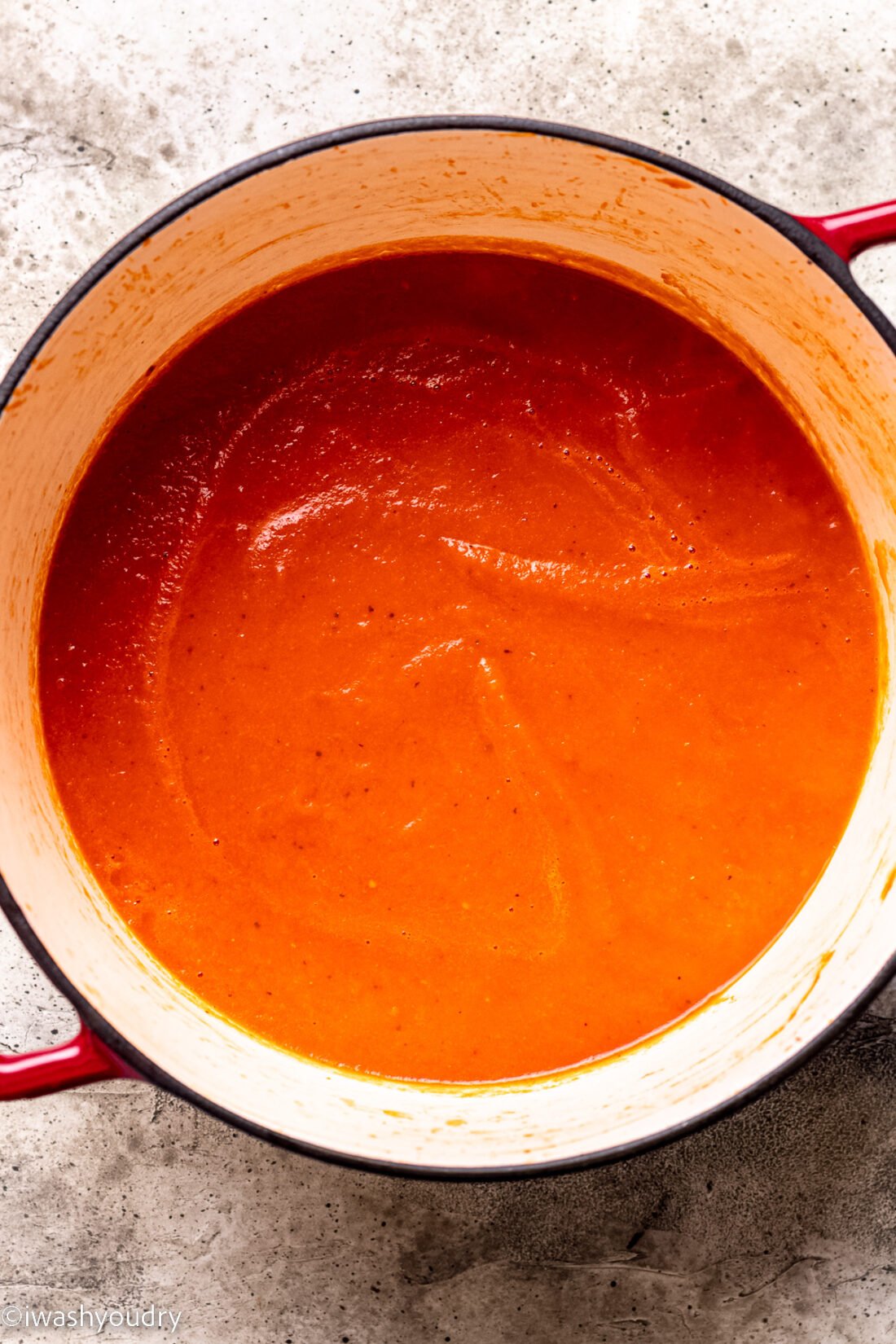 blended tomato soup in pot.