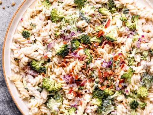 bowl of pasta salad with broccoli and bacon.