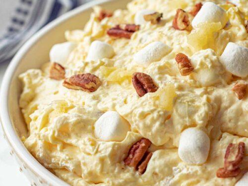 Pineapple fluff salad in white bowl