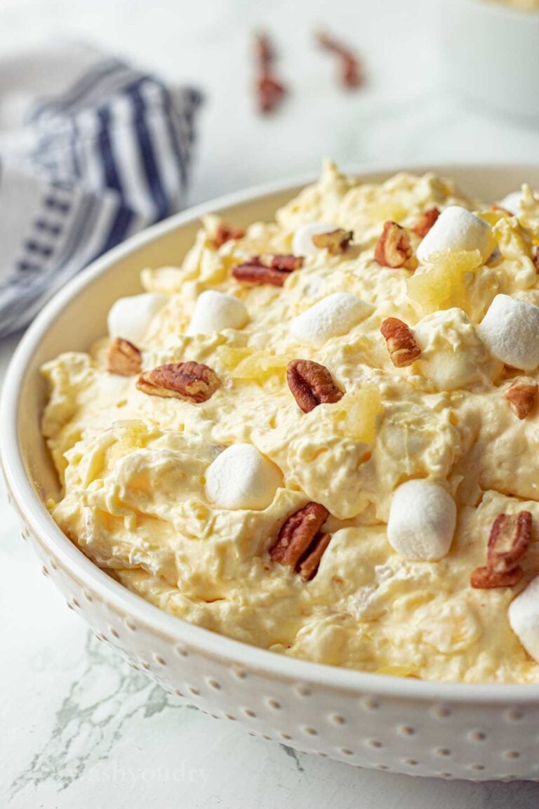 Pineapple fluff salad in white bowl