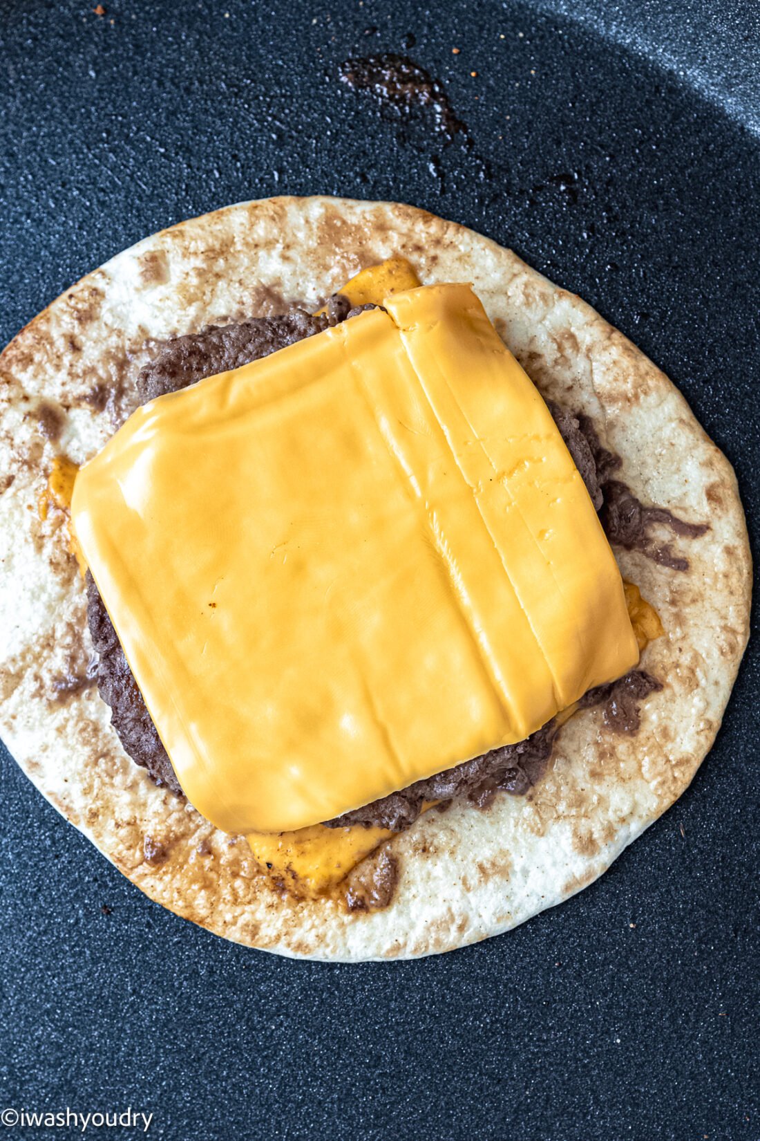 cheese slice on top of big mac smash burger taco.