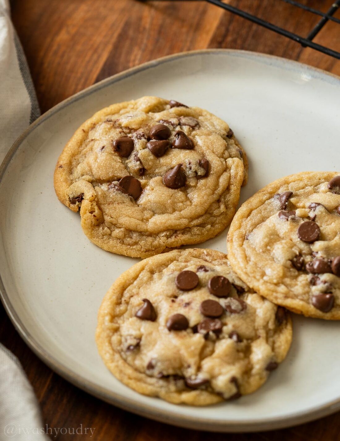 soft and chewy chocolate chip cookies on plate.