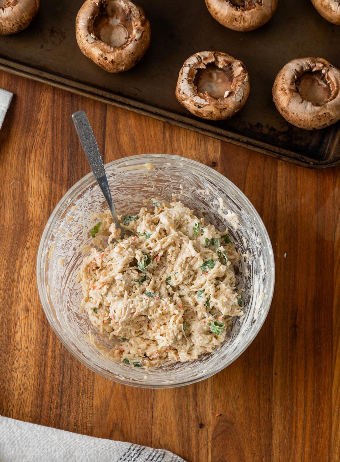 cream cheese crab filling in bowl with spoon.