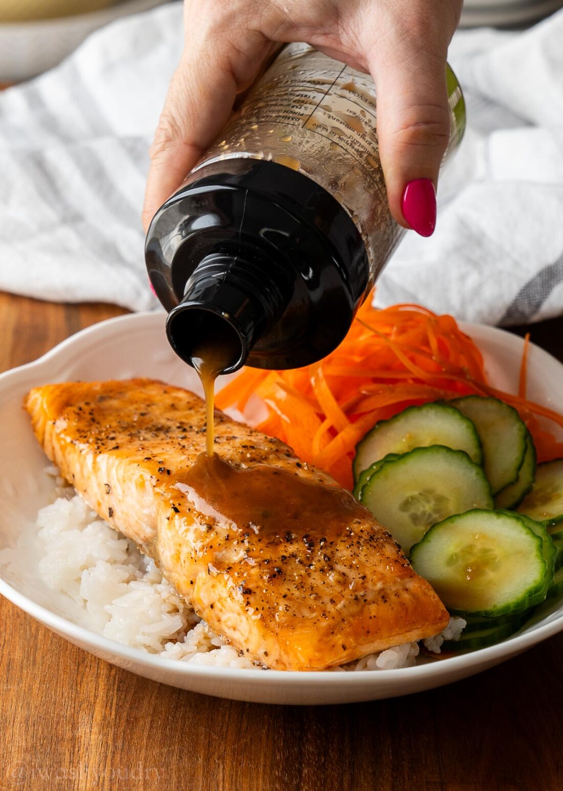 drizzle dressing over salmon bowl.