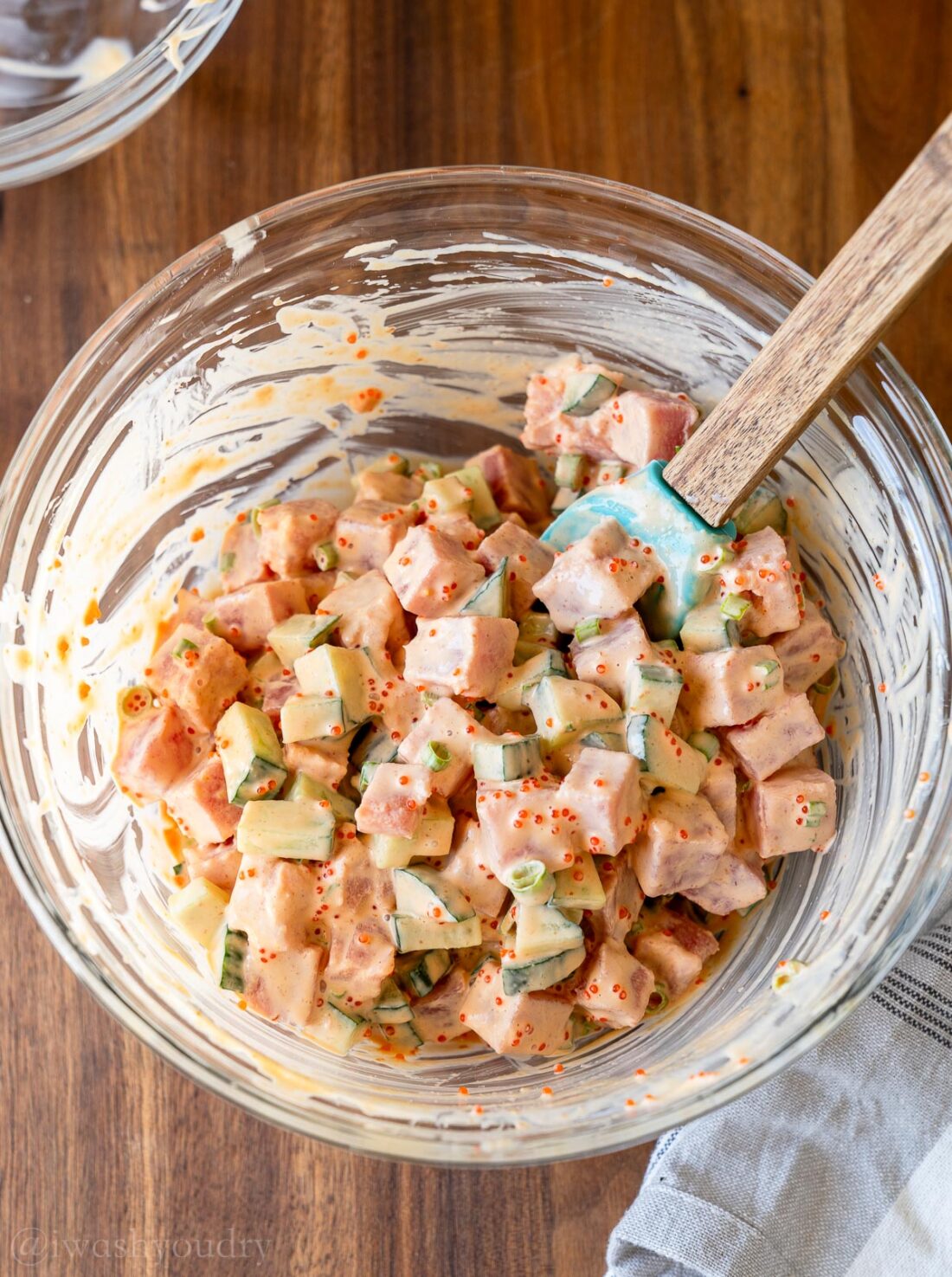 ahi tuna mixture in bowl with creamy spicy mayo sauce added.