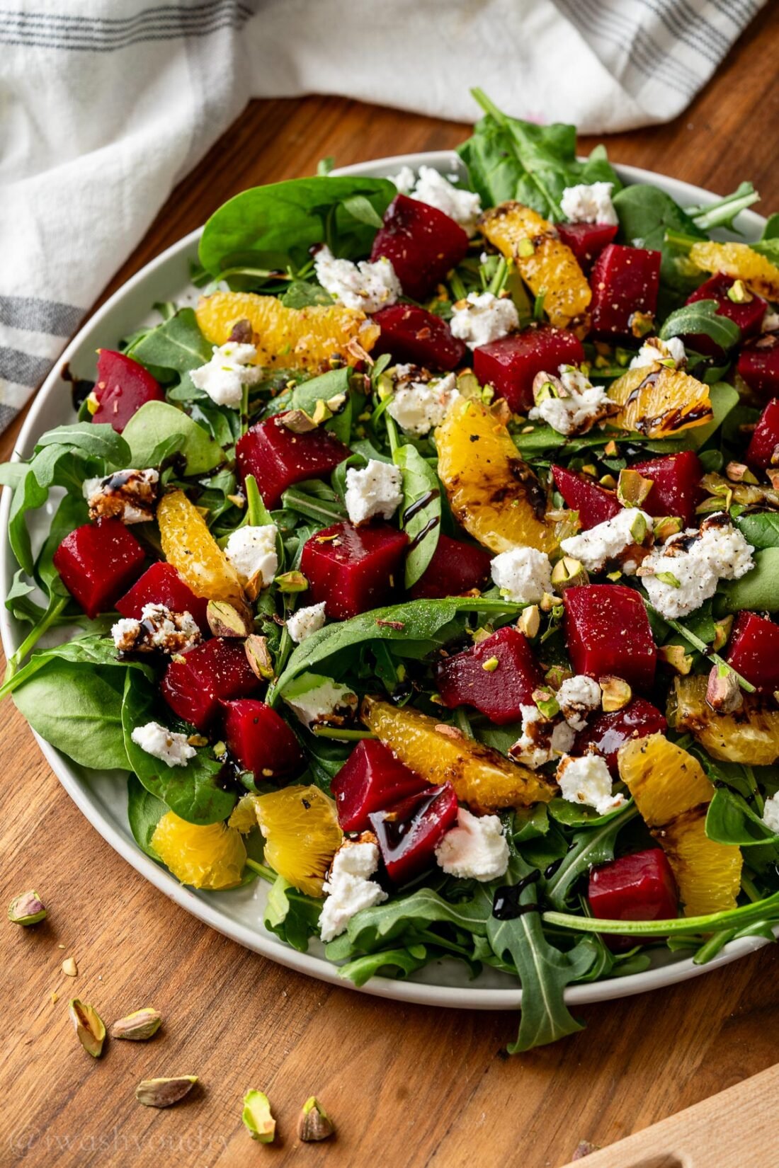 beet and goat cheese salad with arugula and oranges.