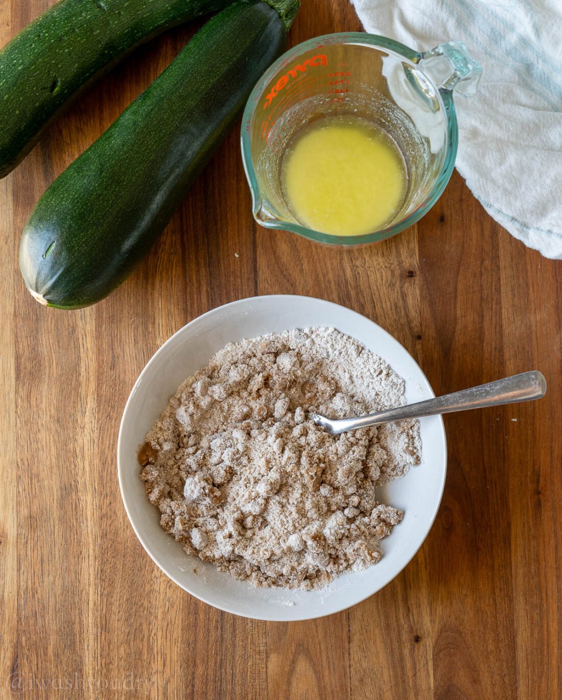 crumb mixture in bowl with fork.