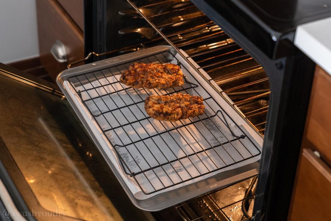 steaks on wire rack in oven.
