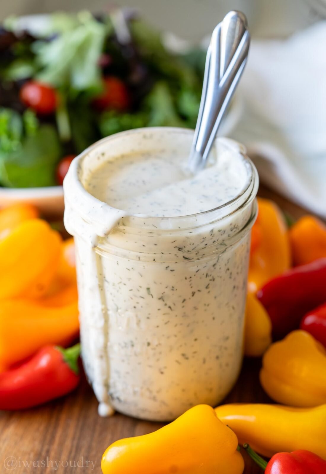 ranch dressing in a jar with spoon inside.