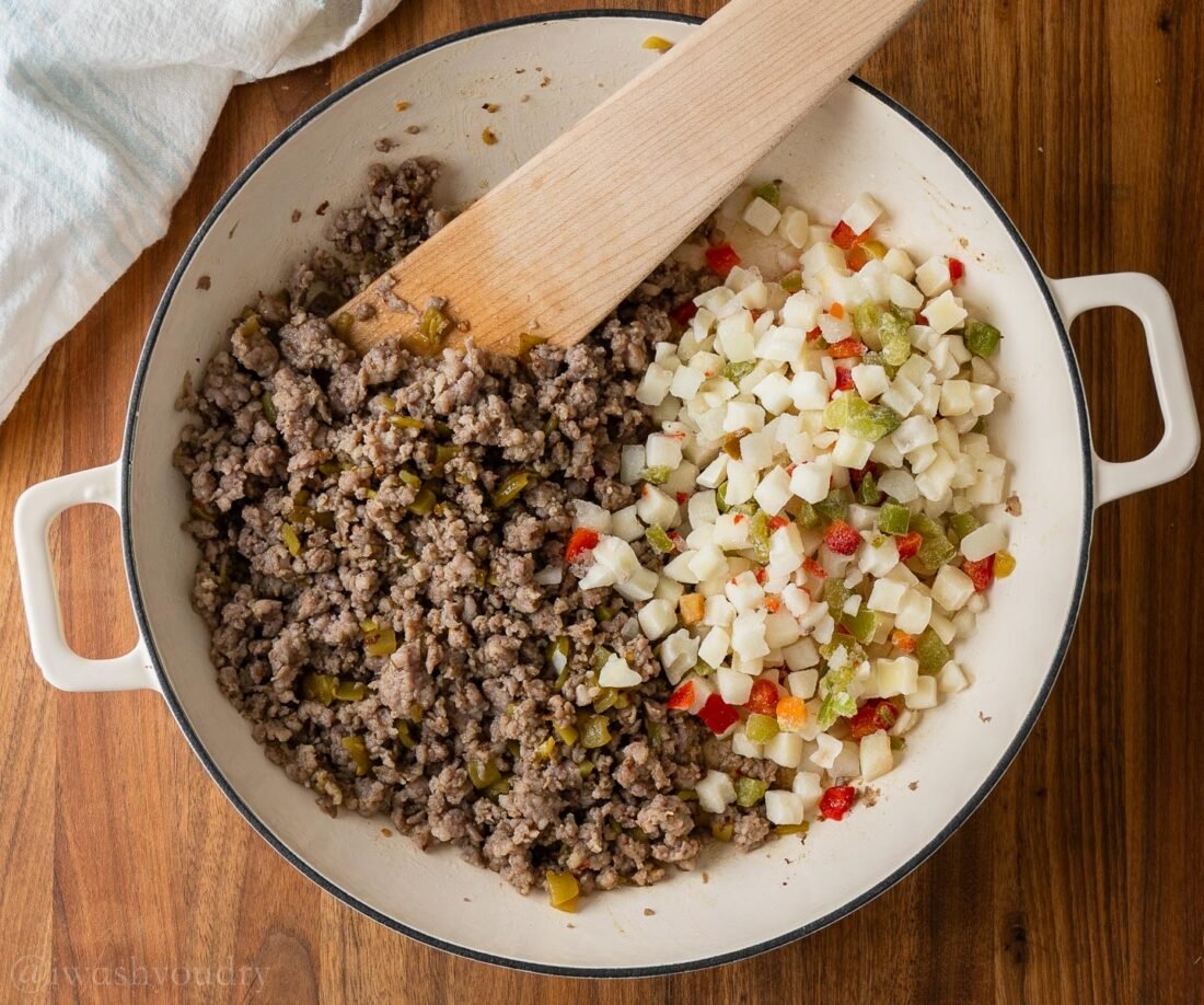 breakfast enchilada filling with sausage potatoes and onions.