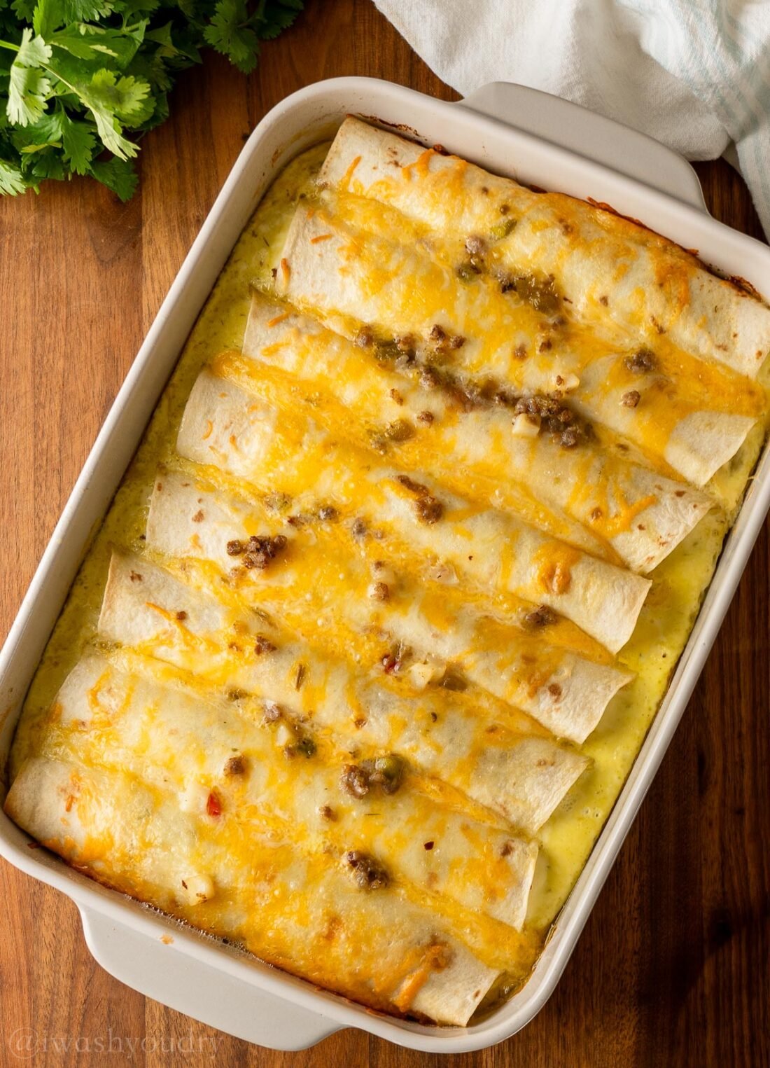baked enchiladas with sausage egg and cheese.