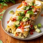 breakfast enchiladas with sausage and cheese.