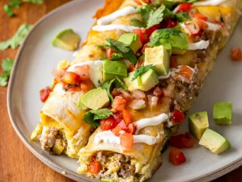 breakfast enchiladas with sausage and cheese.