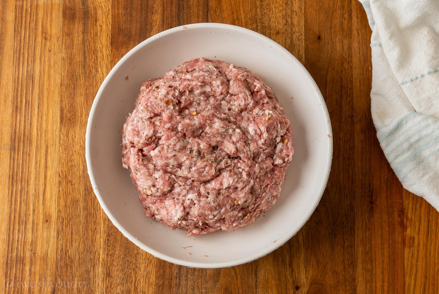 ground pork with seasonings to make breakfast sausage.
