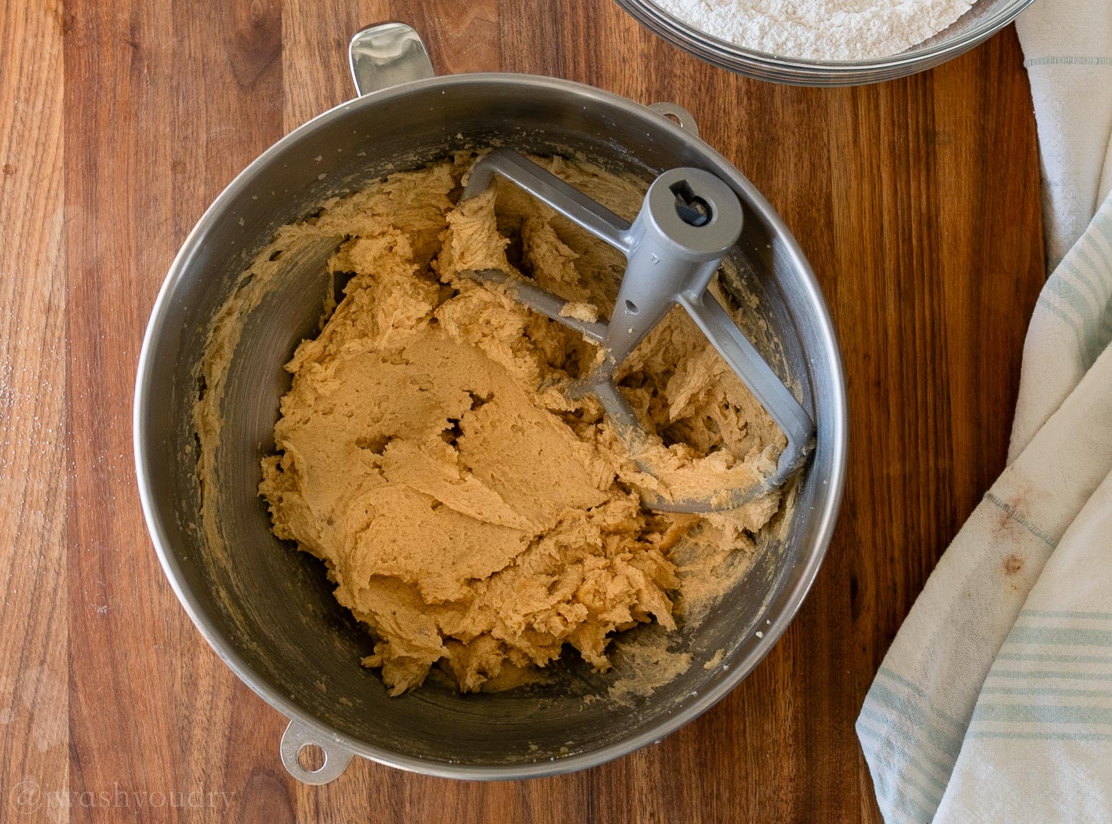 creamed butter and sugars in a mixing bowl with paddle attachment.