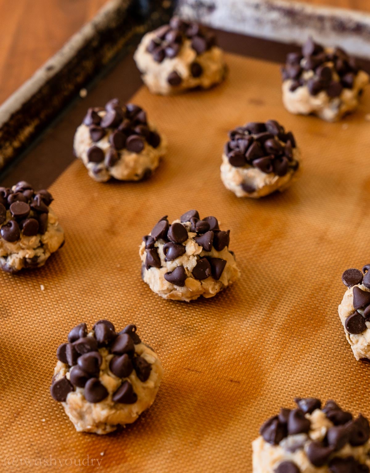 cookie dough covered in chocolate chips.