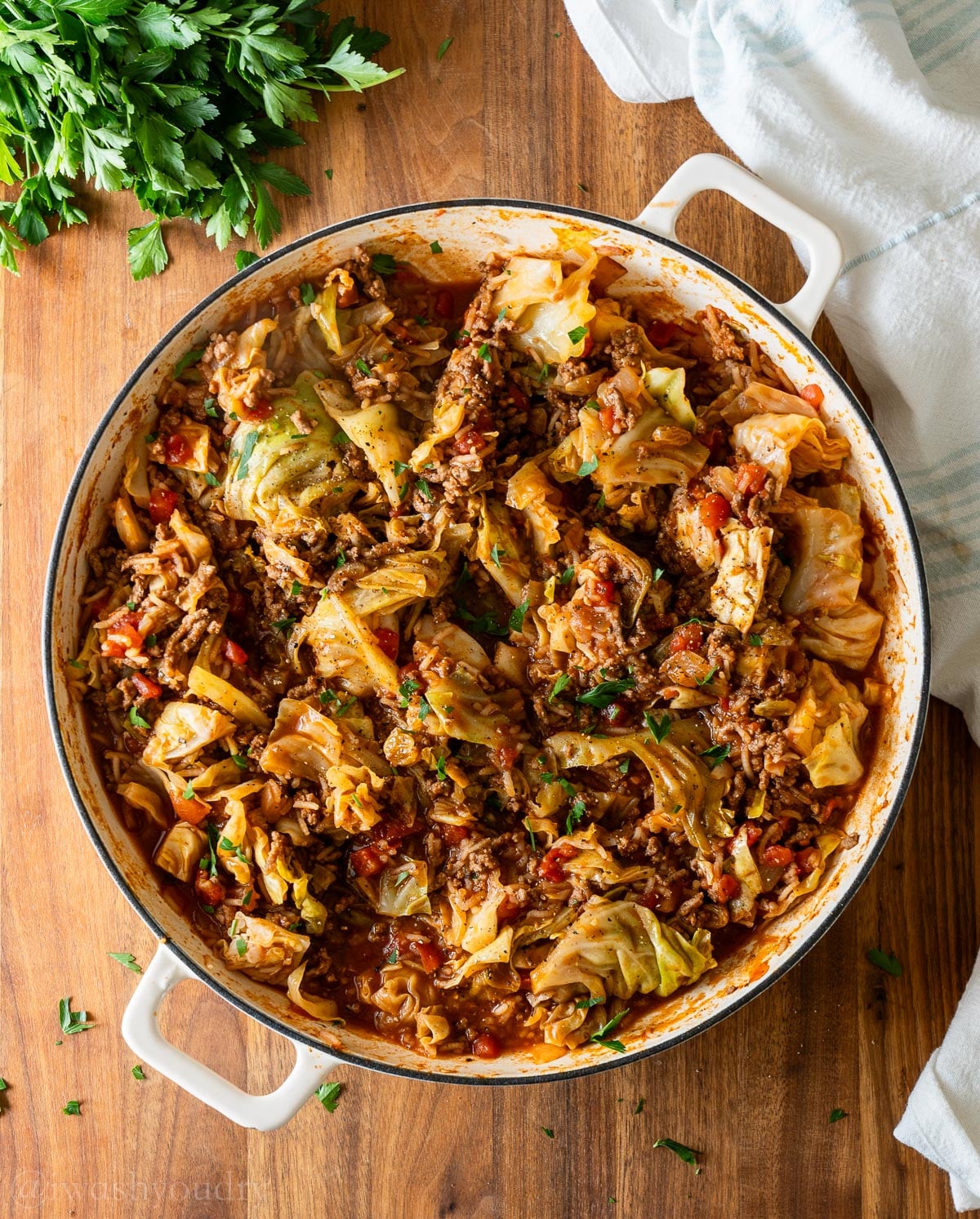 a deconstructed cabbage roll recipe in a skillet with ground beef, rice and plenty of tender cabbage.