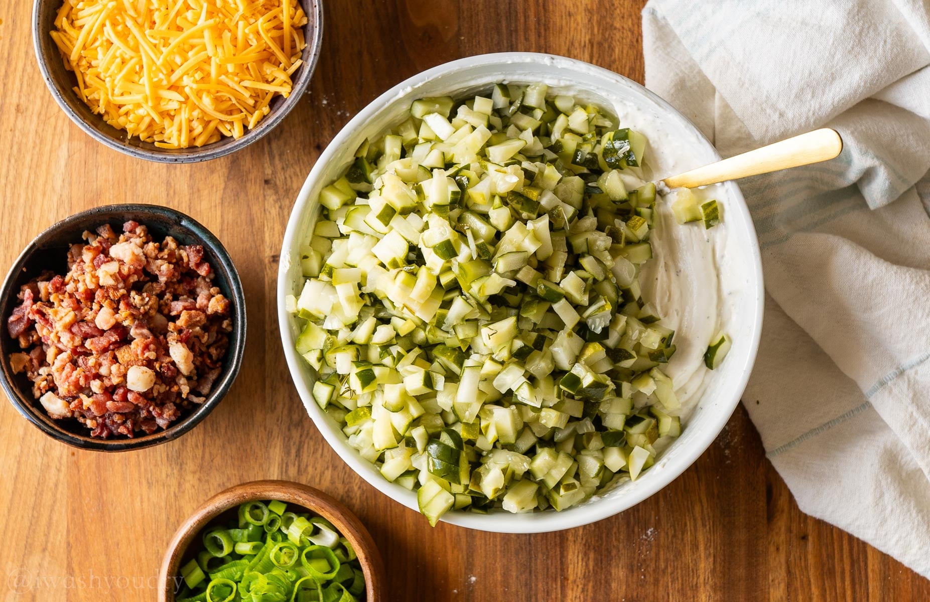 chopped pickles added to creamy dip.