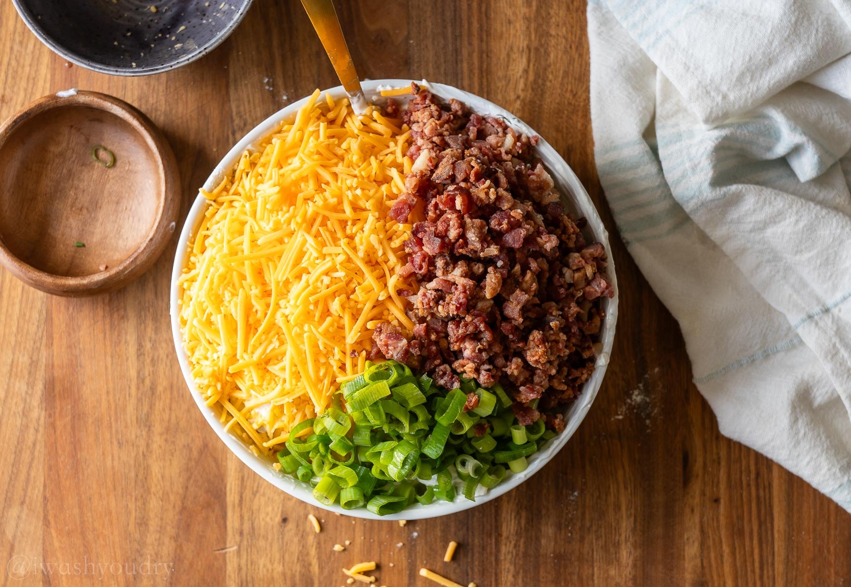 cheese, bacon and green onions added to pickle dip.